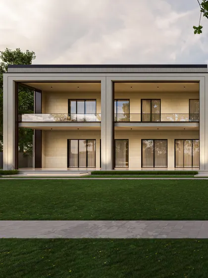 This straight-on view of the farmhouse facade emphasizes its clean, minimalist language. The simple composition of two large, framed volumes creates a powerful and elegant architectural statement.