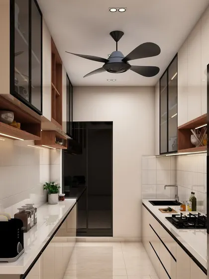 The other side of the parallel kitchen, highlighting the sleek, handleless design and the efficient use of a narrow layout.