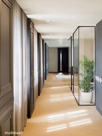 Transparency and connection are key to our studio's design. Glass partitions and open corridors create a sense of flowing, unified space, doing away with the isolation of cubicles and fostering a bright, lively atmosphere for our team.