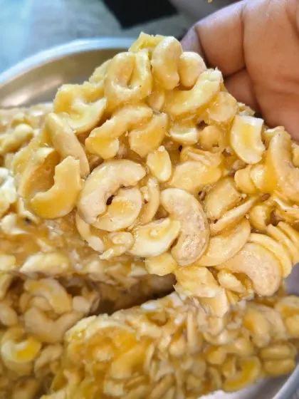This is my homemade Kaju Chikki, a special customized order. It is made with high-quality cashews, pure jaggery, and a touch of homemade ghee, with absolutely no artificial colors or sugar.