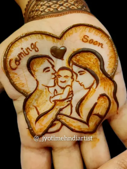 A close-up of a heartwarming family portrait in henna for a baby shower. This design captures the love and anticipation of the parents-to-be.