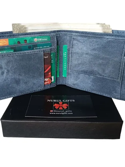 An open view of the personalized denim wallet, showing its interior with multiple card slots and a coin pocket.