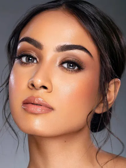 Another angle from the Nari campaign, this close-up captures the texture of the skin and the soft, glossy lips. It's a perfect example of a polished yet natural beauty look.