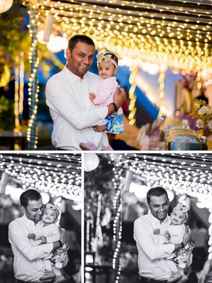 A father holds his baby girl at her birthday party, with both color and black and white versions showing their sweet bond amidst the celebration.