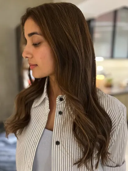 A warm-tone highlight blend using babylights. The subtle mocha brown and warm highlights create a soft, natural-looking color.