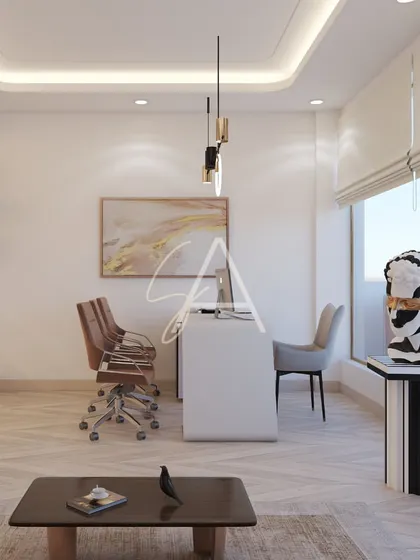 This executive cabin is designed as a serene and inspiring workspace. It features a clean, minimalist desk, ample natural light from the large window, and curated modern art pieces that add personality and sophistication.