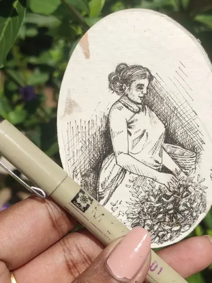 A duplicate of the pen study on a wooden oval.