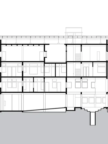 A sectional drawing of the ASA Office, illustrating the building's passive design strategies. It shows the deep overhangs, courtyard spaces, and roof insulation that help regulate temperature naturally.