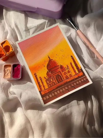 A flat lay of my Taj Mahal painting, surrounded by the gouache cups I used. The colors look so warm and inviting.