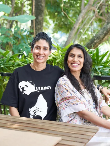 A photo of me and my co-founder, Mahalakshmi. Our shared vision is to raise awareness about natural health solutions and the power of a whole food, plant-based lifestyle.