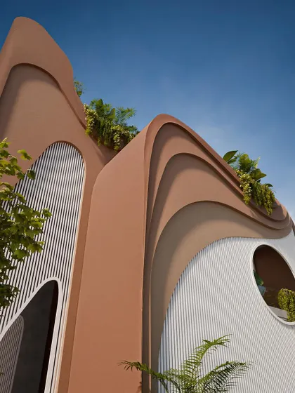 A close-up of the facade, showing the contrast between the smooth, curved surfaces and the textured, vertical panels.
