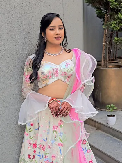 Anjali looking gorgeous for her Carnival party. The makeup features soft pink tones that tie in beautifully with her floral outfit.
