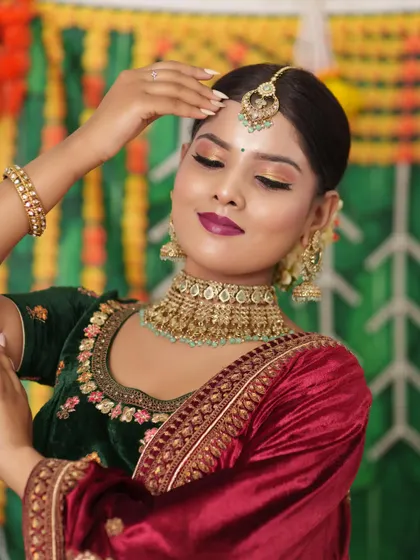 I love helping clients create unique looks. This bride chose a mint-green Kundan choker and matching earrings for her sangeet, showing how you can mix traditional styles with modern color palettes.