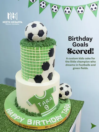 Birthday Goals: Scored! A custom kids cake for a little football champion, complete with a jersey and soccer balls.