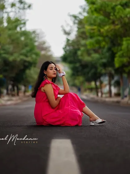 A low-angle perspective changes everything. This shot, taken from the middle of the road, creates a unique and dramatic portrait that feels both powerful and playful.