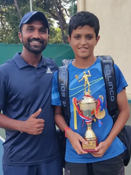 Om Verma with his coach after winning the Doubles title at the All India Super Series held at the prestigious Bombay Gymkhana.