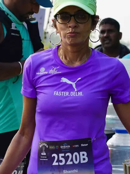 A quick stop at an aid station. Proper hydration and fueling strategy during a race is something I emphasize in my coaching.