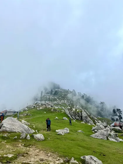 The misty and mysterious atmosphere at Triund top, where clouds often roll in and transform the landscape completely.