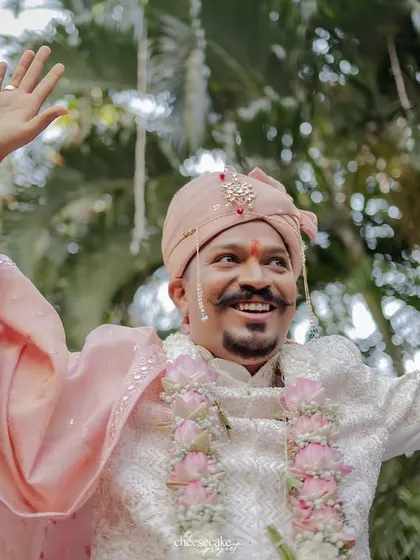 The groom's grand entrance, full of energy and happiness.