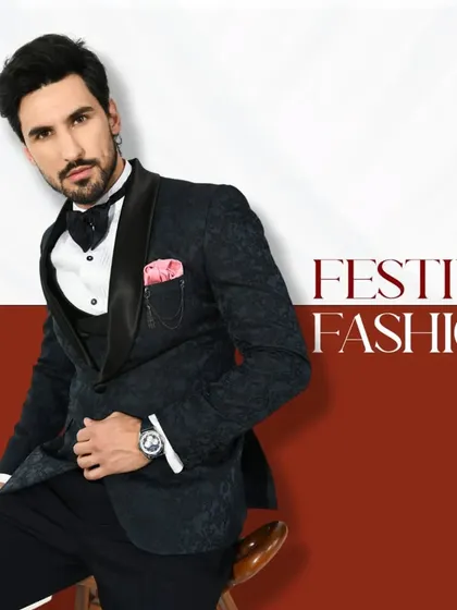 Festive fashion at its finest. This black patterned tuxedo with a pink pocket square is perfect for elevating your style game.