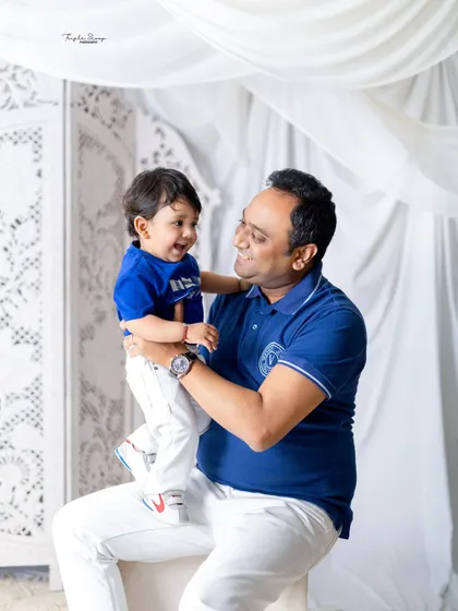 A father and son sharing a laugh. I love capturing these genuine moments of connection that show the true joy of fatherhood.