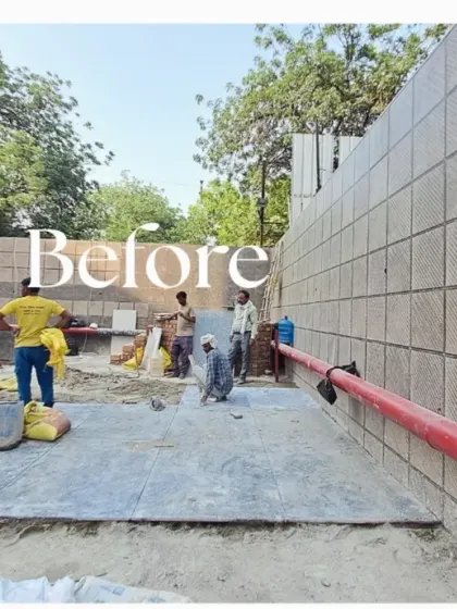A wide 'Before' view of the site. We see these large, bare walls as an opportunity to introduce a massive burst of nature and life into the environment.