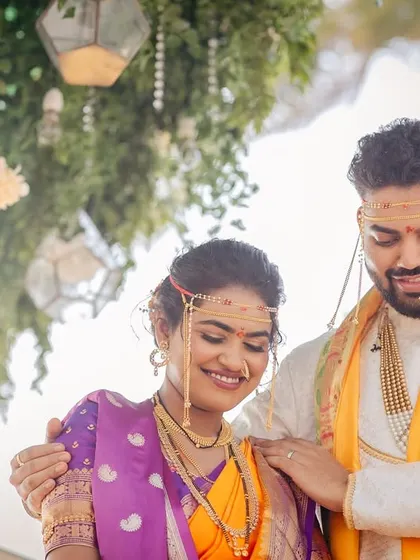 A beautiful, shy smile from the bride as her groom looks on. These candid moments are priceless.