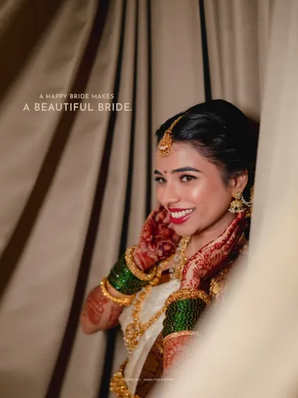 'A happy bride makes a beautiful bride'. A joyful portrait capturing the bride's stunning smile and confidence.