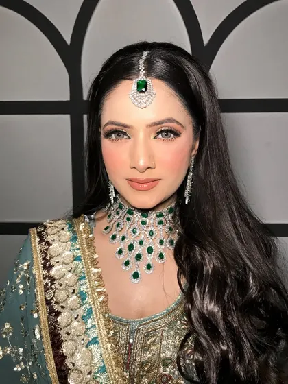 A close-up of this beautiful Pakistani-inspired makeup, showing the flawless base and soft, shimmering eyes.