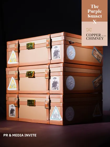 These vintage-style suitcases were custom-made for a Copper Chimney PR event. The design tells the story of the brand's origins, making it a deeply meaningful corporate gift.
