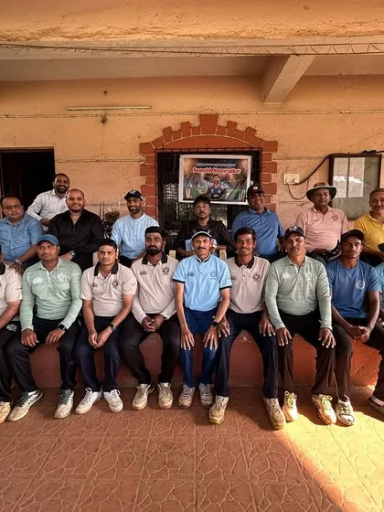 Our coaching and support staff pictured with Saurabh Netravalkar. This reflects the team effort behind the success of our players.
