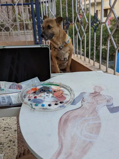 Sometimes I take my work outside to the balcony for some fresh air. My dog always keeps a watchful eye on the neighborhood while I paint.