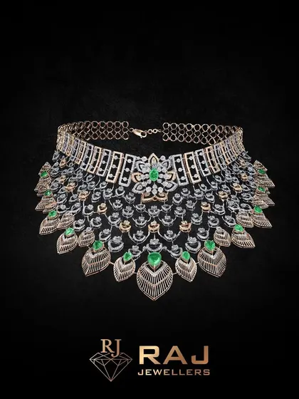 This grand necklace is more than material, it is an emotion. The cascading layers of leaf-like elements are studded with sparkling stones and accented with green gems, creating a piece that evokes a sense of pure opulence and celebration.