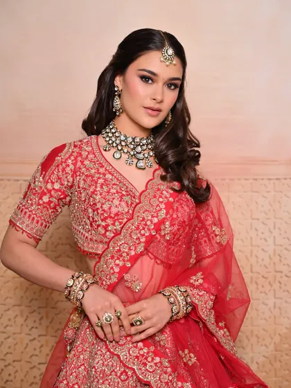 This portrait showcases the complete look with the dupatta setting, emphasizing how the makeup works with the entire outfit.