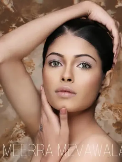 A soft and ethereal look on a fair-skinned model, with a focus on dewy, glowing skin.