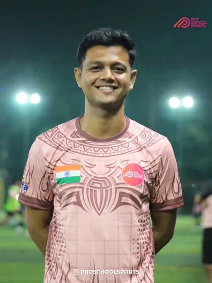 A portrait of one of our smiling coaches during our Navratri celebration.