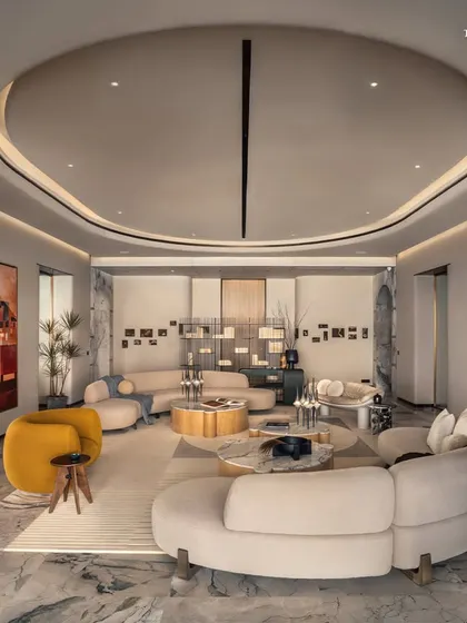 Where architecture meets atmosphere, this living room at our flagship Palais Royale project is designed to exhale serenity. The space is defined not by grandeur, but by grace, with lime wash-textured walls and tempest white marble floors that reflect light softly, allowing the sea view to take center stage.