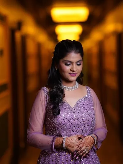 A serene portrait showcasing the soft glam makeup and how it enhances her natural features.