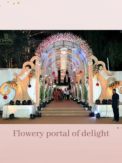 A flowery portal of delight. We love creating surreal entrances like this one at our Kalidas Open Ground, blending magic with reality to welcome your guests.