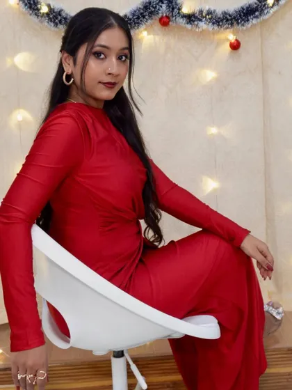 Another portrait from the Christmas shoot, capturing the festive and glamorous vibe of the look.