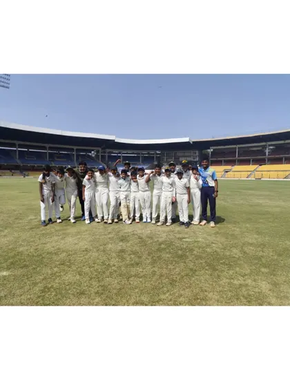 Our full U-12 squad with their coach at Chinnaswamy Stadium, soaking in the professional atmosphere.