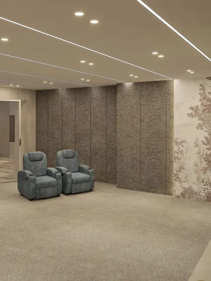 The basement also includes a state-of-the-art home theater with sound-absorbing panels and comfortable blue recliner chairs.