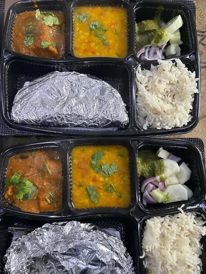 A pair of our delicious thalis with dal and soya chaap masala. A hearty and satisfying meal for any time of the day.