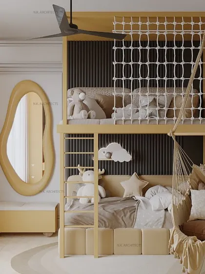 Kids' spaces should be interesting and playful. This room features a bunk bed with a safety net, a cozy hanging swing, and a world map wallpaper, creating a refreshing and fun environment.