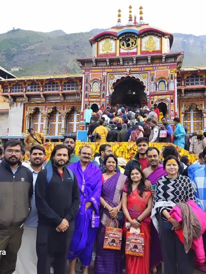 Our group in front of the Badrinath temple. These pilgrimage tours are designed to be comfortable and accessible for travelers of various age groups.