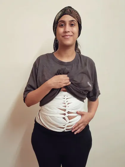 This is a postpartum belly wrap, an Indonesian style called Bengkung. I started wrapping my abdomen two days after my normal delivery for physical support. It helped me feel more sturdy and secure during the initial recovery phase.