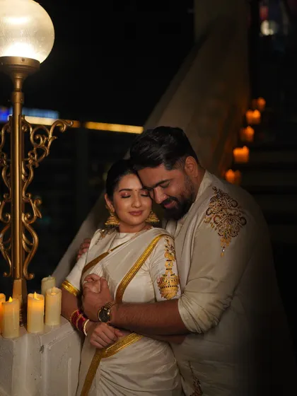 An intimate moment from the Diwali shoot. The classic white and gold is a timeless combination that always looks elegant and celebratory.