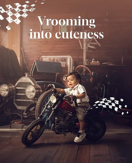 Vrooming into cuteness! The vintage garage theme with a miniature motorcycle is perfect for little adventurers who are born to be wild. The rustic backdrop adds a cool, timeless feel.