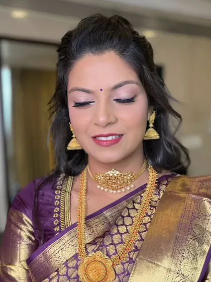 A close-up of the soft, shimmery eye makeup, perfect for a South Indian bride.