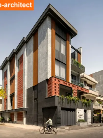 The Step Maze House, featured by e-architect, is a serene haven on a trapezium-shaped corner plot. The unique site guided the massing, resulting in a design that harmonizes with its surroundings while ensuring privacy and comfort.